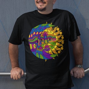 May include: A black t-shirt with a colorful graphic of a sun and moon with faces. The graphic is in a psychedelic style with bright colors and intricate details.