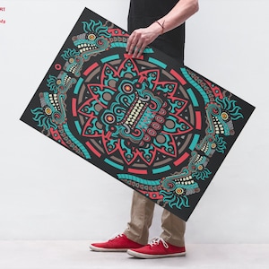 May include: A black and white poster with a colorful mandala design featuring a central face with red, blue, and yellow accents. The mandala is surrounded by four smaller faces with similar colors and patterns.