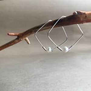 Geometric pearl and silver square hoop earrings. Handmade using sustainable silver and antique pearls