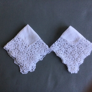 Two matching white linen handkerchiefs with crocheted edge