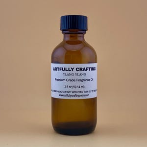 May include: A 2-ounce bottle of Ylang Ylang Premium Grade Fragrance Oil, labeled "Artfully Crafting".