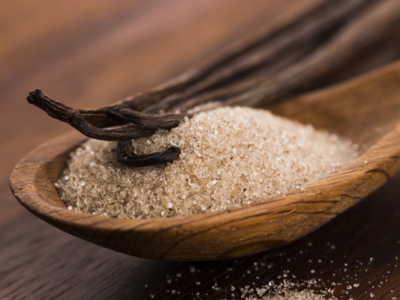 Closeup of dried vanilla and raw sugar representing scent in phthalate free, premium grade Exotic Oud Wood Fragrance Oil for soap and candle making