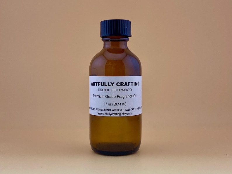 2 oz amber bottle of phthalate free, premium grade Exotic Oud Wood Fragrance Oil for soap and candle making