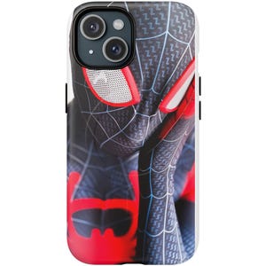 May include: A black and red phone case featuring a Spider-Man design. The case has a detailed graphic of the character's suit, with red accents on the eyes and other areas. The case is designed to fit a smartphone.