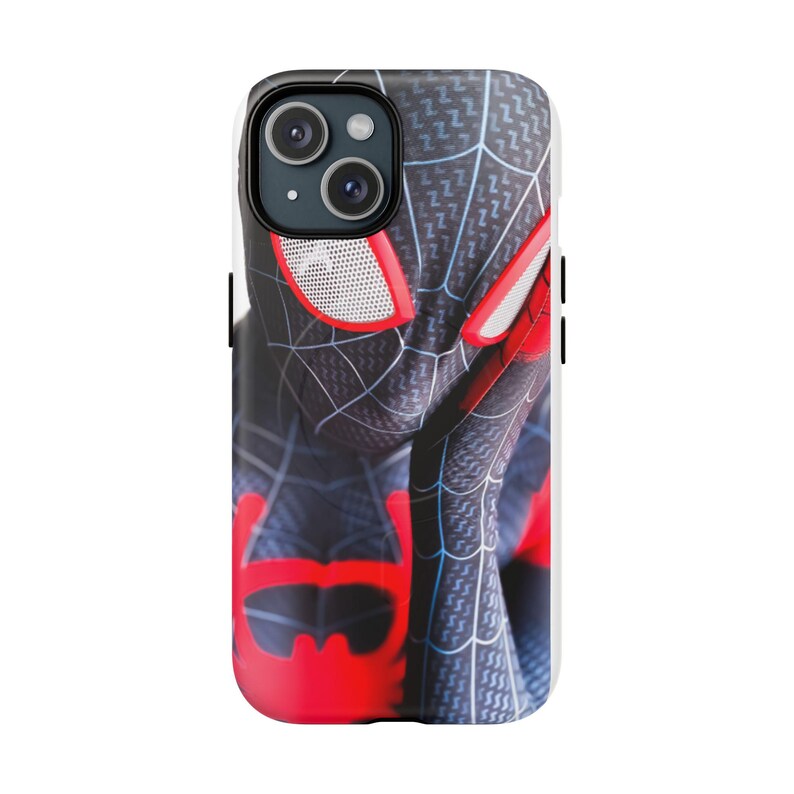 May include: A black and red phone case featuring a Spider-Man design. The case has a detailed graphic of the character's suit, with red accents on the eyes and other areas. The case is designed to fit a smartphone.