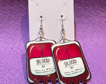 Pendientes de bolsa de sangre