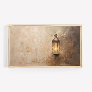 May include: A framed painting depicting a lantern hanging against a textured, beige background. The lantern is made of metal and has a glass window with a warm glow emanating from inside.