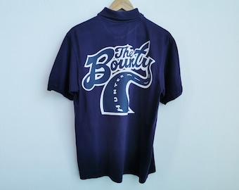 Camiseta Bounty Hunter Polo con logo grande de Bounty Hunter Talla M/L