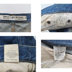 Puede incluir: Primeros planos de vaqueros de mezclilla azules con m&uacute;ltiples etiquetas. Una etiqueta dice "EDWIN MADE IN ITALY". Otra etiqueta muestra la talla 30x33. Otras etiquetas proporcionan instrucciones de lavado y la composici&oacute;n de la tela. Los vaqueros son 100% algod&oacute;n.