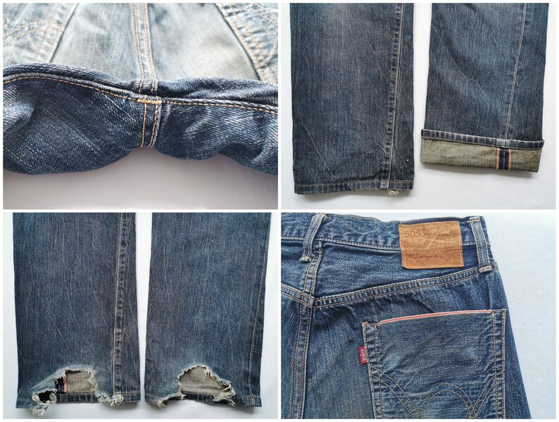 Pu&ograve; includere: Primi piani di jeans di denim blu, che mostrano dettagli come le cuciture, le aree usurate e l'orlo ripiegato che rivela un bordo rosso e bianco. La tasca posteriore ha un'etichetta rossa.