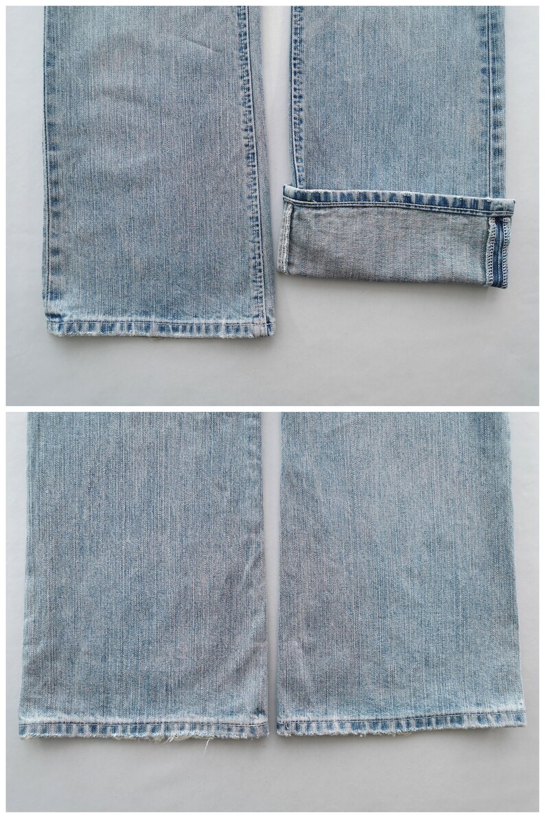 Pu&ograve; includere: Jeans in denim blu chiaro con taglio dritto. Una gamba &egrave; risvoltata, rivelando l'orlo interno. I jeans hanno un classico design a cinque tasche e un lavaggio sbiadito. Gli orli inferiori sono sfilacciati.
