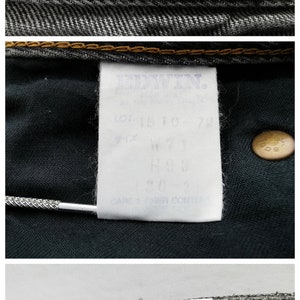 May include: A pair of grey denim jeans featuring a yellow and red Edwin brand label with the text "ONLY GENUINE" and "Sold only at the finest stores." The interior white care tags display "LOT 1510-72," "W 71," and "100%" cotton composition.