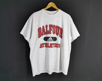 Camiseta Adidas vintage con el logotipo de Adidas Balfour Athletics, talla XL
