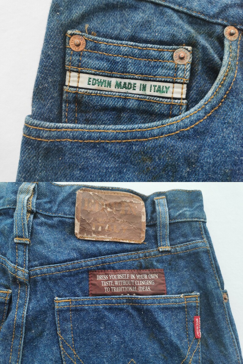 Puede incluir: Primer plano de unos vaqueros azules con costuras visibles y remaches de cobre. Los vaqueros tienen una etiqueta en el bolsillo que dice "EDWIN MADE IN ITALY". El bolsillo trasero tiene una etiqueta con el texto "DRESS YOURSELF IN YOUR OWN TASTE, WITHOUT CLINGING TO TRADITIONAL IDEAS."