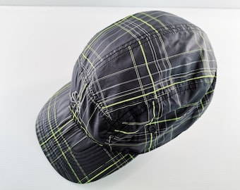 Cappello Nike con motivo a scacchi e pinwheel