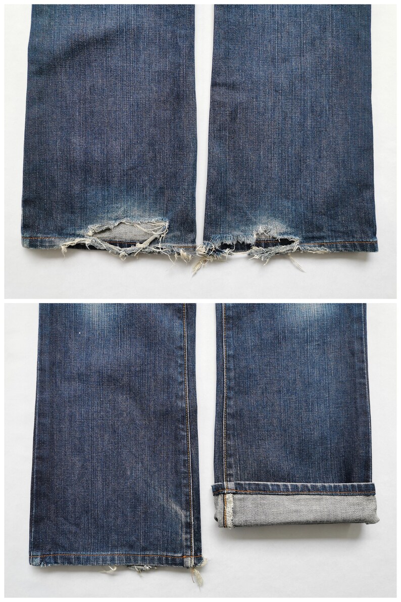 May include: Close-up of two pairs of blue denim jeans. One pair has distressed, frayed hems with large holes. The other pair has the hems rolled up, revealing the lighter-coloured interior fabric. The jeans are on a white background.