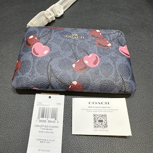 Bolso de mano Coach of New York con cremallera en las esquinas y estampado de cerezas NUEVO + AUTÉNTICO