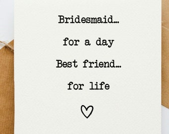 May include: A white card with black text that reads "Bridesmaid... for a day Best friend... for life" with a small heart at the bottom.