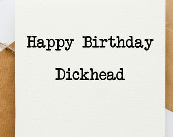 May include: White card with black text that reads "Happy Birthday Dickhead".