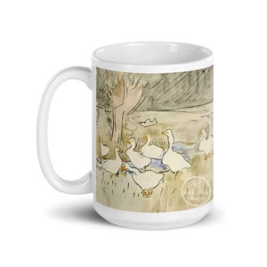May include: White ceramic mug with a watercolor illustration of a group of geese in a pond. The geese are white with orange beaks and feet. The background is a light brown with a dark gray sky. The mug has a black text at the bottom that says "Matt Collins Designs".
