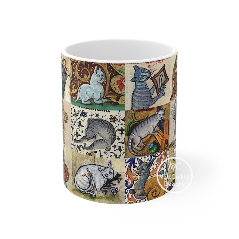 May include: White ceramic mug featuring a medieval-style illustration of cats in various poses. The design includes a patchwork of images with ornate floral and scrollwork backgrounds. The mug has a glossy finish and a standard handle.