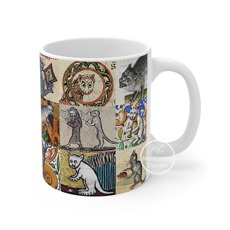 May include: White ceramic mug featuring a collage of medieval illustrations of cats and other creatures. The artwork includes various colors and intricate details, creating a unique and artistic design. The mug has a white handle and the text "MattCollins Designs".