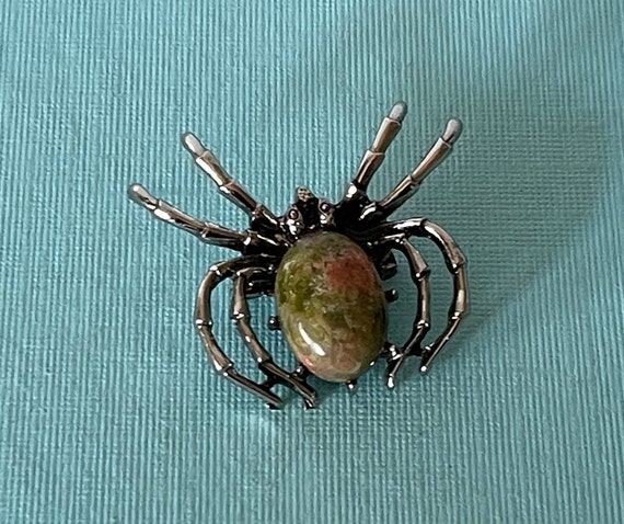 Art Deco period red galalith spider brooch - photographed by