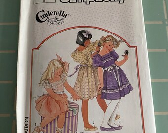 Various Girl’s Dress Patterns by Cinderella Clothing Industries- Simplicity