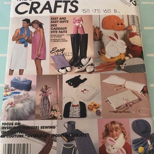 May include: McCall's Crafts pattern number 2815, featuring a variety of easy craft projects, including a bunny rabbit, a cat, a boot, a tissue box cover, a bottle cover, a mug cozy, a book cover, and a scarf. The pattern includes instructions for making these items, as well as tips for using an overlock sewing machine.