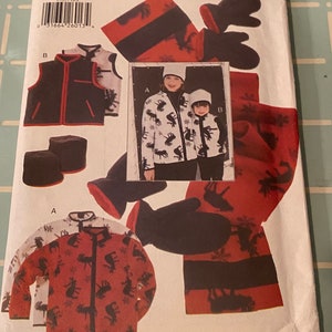 May include: A sewing pattern for a matching set of fleece jackets and hats for adults and children. The pattern includes a moose print design in black and white on a red and white background. The pattern is titled "Mommy & Me" and the pattern number is 9705.