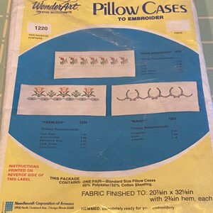 May include: Package of two pillowcases for embroidery. The package includes instructions and thread requirements for three different designs: "Rose Rhapsody", "Peerless", and "Magic". The pillowcases are 20 1/2 inches by 32 1/2 inches with a 2 3/4 inch hem.