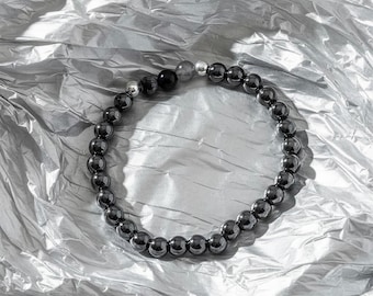 Armband met sterrenbeeld Steenbok, bezet met 6 mm mineralen en sterling zilver.