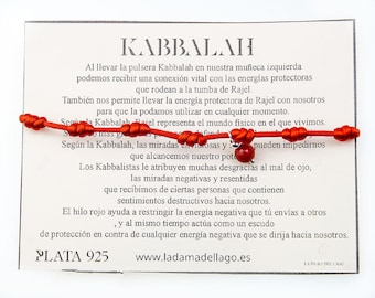 Pulsera kabbalah seda roja y siete nudos con coral colgando en plata de ley