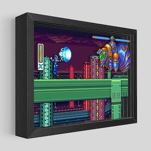 May include: A pixelated video game scene featuring a blue robot character firing a blue energy blast at a flying enemy robot. The scene is set against a backdrop of a city skyline at night.