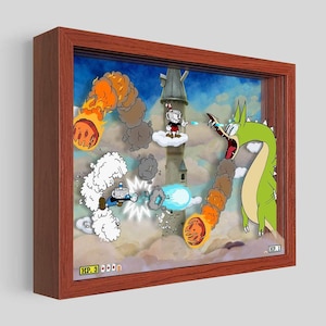 Può includere: Un'illustrazione incorniciata di una scena di videogioco con due personaggi, Cuphead e Mugman, che combattono contro un drago verde in un cielo pieno di nuvole e fuoco. I personaggi sparano proiettili al drago, e la scena si svolge sullo sfondo di una torre alta. L'immagine include il testo "HP. 3" e "HP. 1".