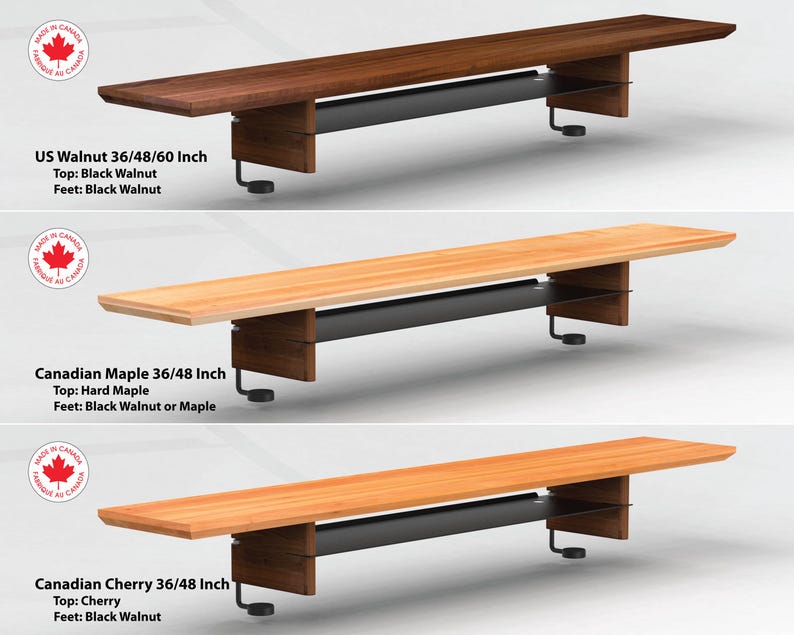May include: Three wooden tabletops with black metal legs and shelves. The tabletops are made of US Walnut, Canadian Maple, and Canadian Cherry. The tabletops are 36, 48, and 60 inches long.