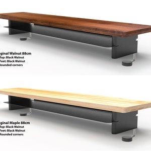 May include: Two wooden shelves with black walnut feet and rounded corners. The top shelf is made of black walnut wood and the bottom shelf is made of maple wood. Both shelves are 88 cm long.