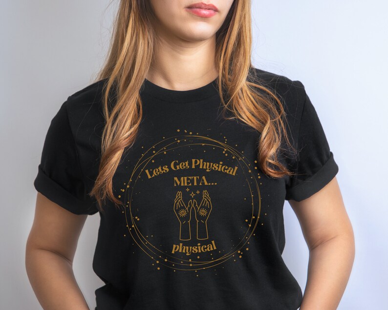 May include: Black t-shirt with a gold circle design featuring the text "Let's Get Physical META... physical".