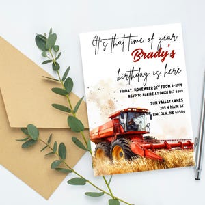 May include: Birthday party invitation with a red combine harvester illustration. The invitation reads "It's that time of year, Brady's birthday is here." Includes event details and RSVP information. A kraft paper envelope and pen are also present.