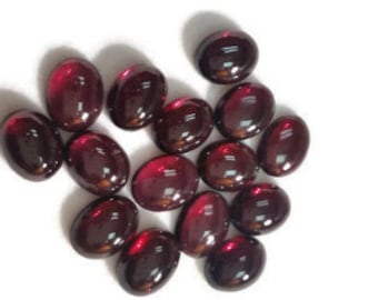 Cabujones ovalados de granate rojo natural de 7 x 9 mm (paquete de 8 unidades), origen India.