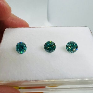 6MM Blue Moissanite faceted Round, pack of 1 pc with GRA certificate.