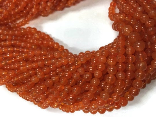 Carnelian Micro Faceted Round 14 inch strand pack of 2 strands 4 mm approx Carnelian Micro Faceted Round 14 inch strand pack of 2 strands 4 mm approx