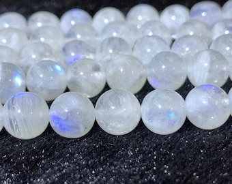 Moonstone 8MM cuentas redondas, perlas de piedra de luna arco iris, longitud 16 " y calidad AAA, origen India . Calidad fina y ronda perfecta con flash azul
