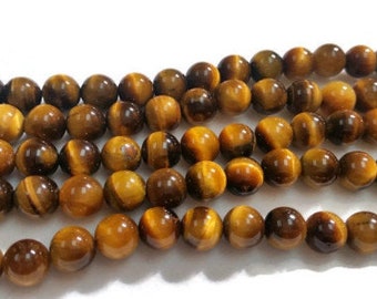 Perline multi occhio di tigre. Perlina rotonda da 4 mm, 6 mm, 8 mm, 10 mm, 12 mm. Verde, blu, viola, multicolore. Filo intero di ottima qualità, 15,5 mm. - Italia