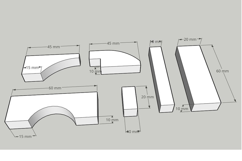 May include: Diagram of five wooden blocks with measurements in millimeters. The blocks are various shapes and sizes, including a curved block, a rectangular block, and a block with a curved top.