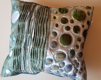 Shabby chic cushion in steel blues and greens, tactile and lovely soft feel.