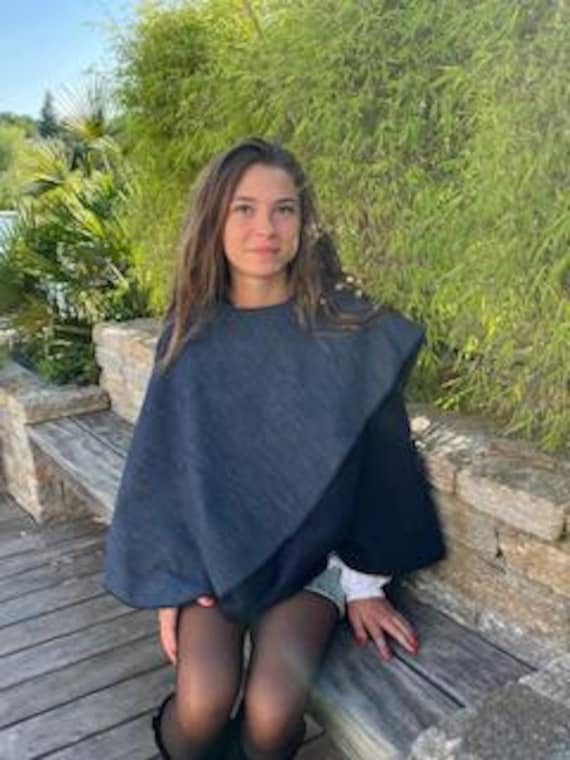 Fleece cape with denim flap