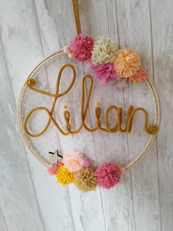 Embroidery hoop door sign with lace and name