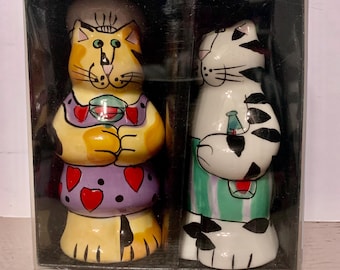 Cat Lover’s dream sets of vintage salt and pepper shakers. All in great shape, if you cats toy must check this out!