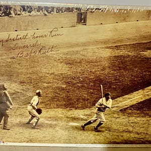 A 1993 Major League Baseball reproduction of Babe Ruth’s 60th home run of the 1927 season. The signature was on the original.
